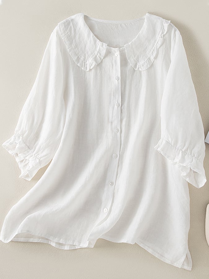 Blouse femme fluide et légère à col volants, confortable pour un style printanier ou estival chic.