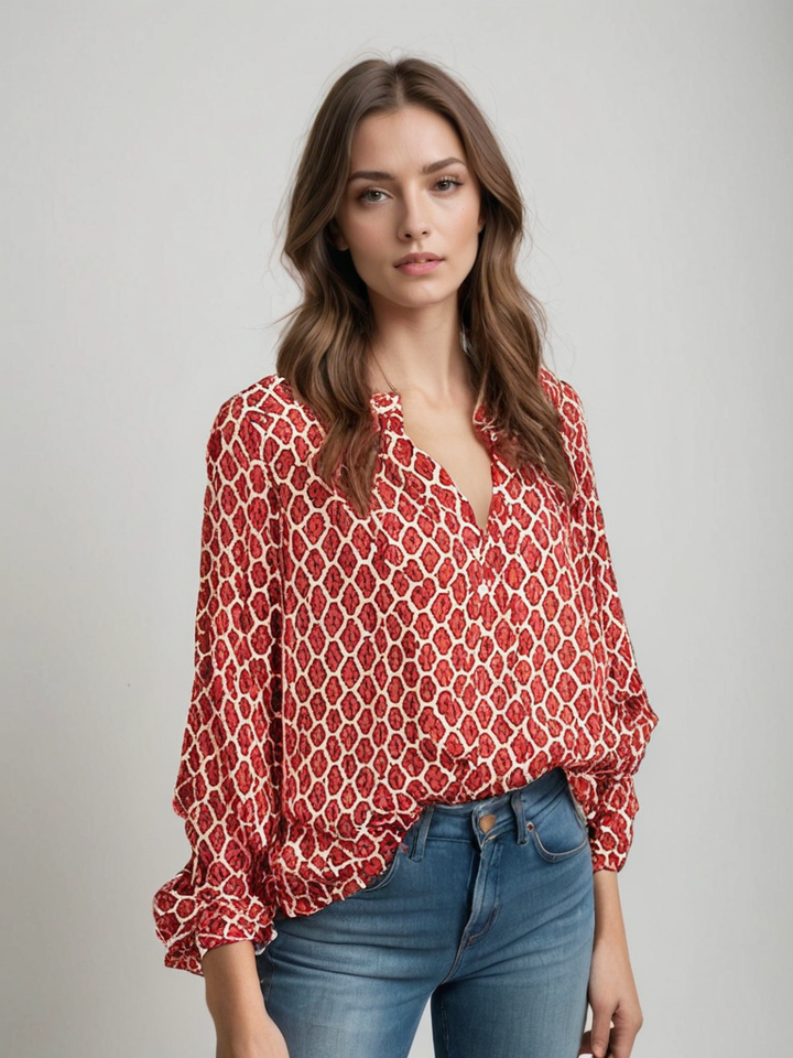 "Chemisier femme en coton, col V élégant, manches longues, motif géométrique, disponible en bleu, noir et rouge."