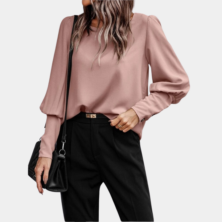 Magnifique chemisier femme à manches ballon longues. Style élégant, chic et décontracté, parfait pour toutes occasions.