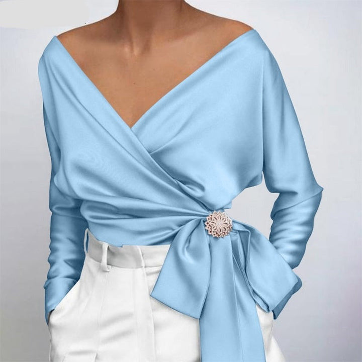 Chemisier élégant pour femmes, idéal pour un look chic et décontracté ou une tenue de bureau sophistiquée.