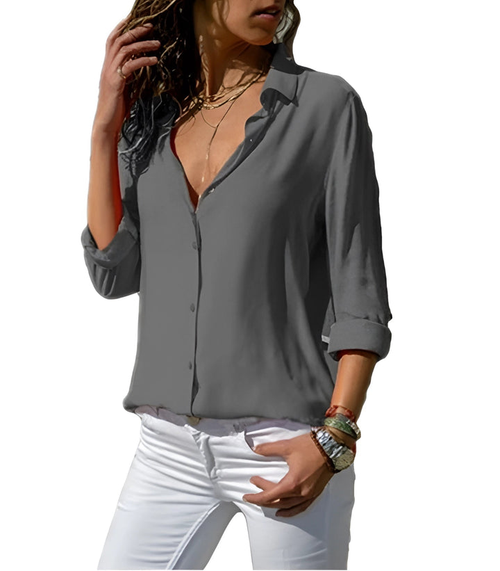 Blouse femme orange à manches longues, idéale pour le printemps et l'automne, chic et confortable.