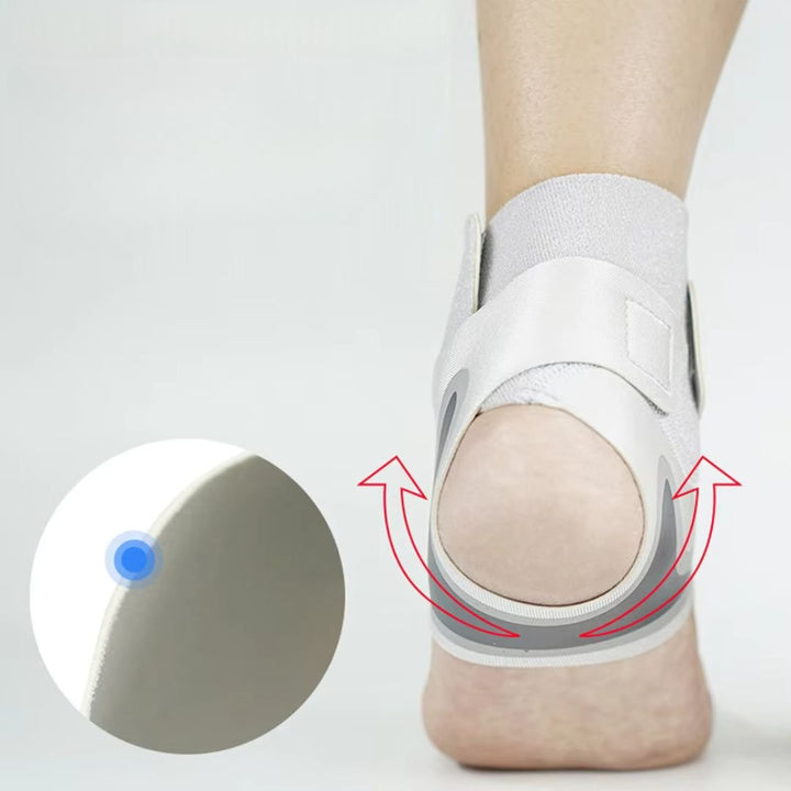 "Chevillère de maintien grise pour entorse, tendinite et arthrite, offrant confort et stabilité sous les vêtements."