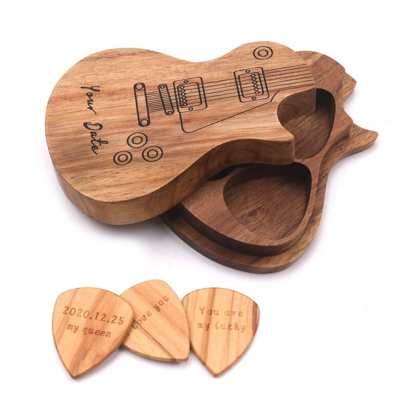 Coffret cadeau médiators guitare en bois gravés.  Accessoires guitare, design élégant.