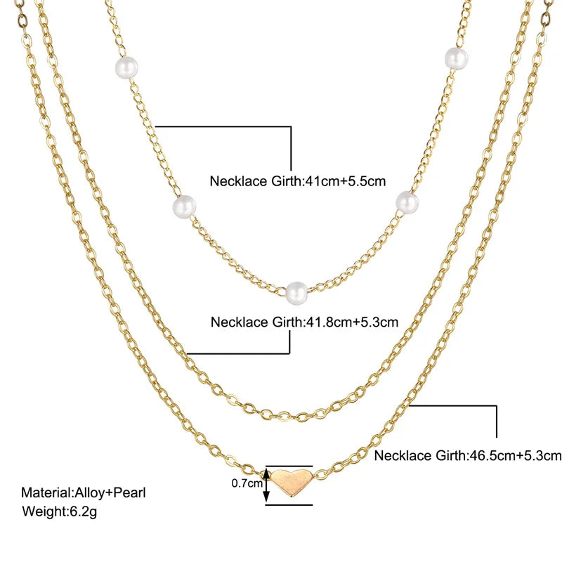 Collier femme 3 couches argent, pendentif croix discret. Bijou chic pour toute occasion.