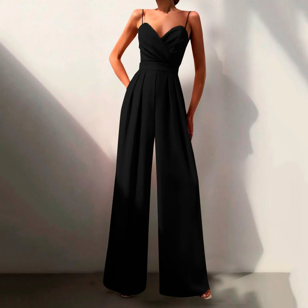 Combinaison estivale fluide, élégante.  Coupe ample, décolleté croisé, taille cintrée.  Parfait pour l'été.