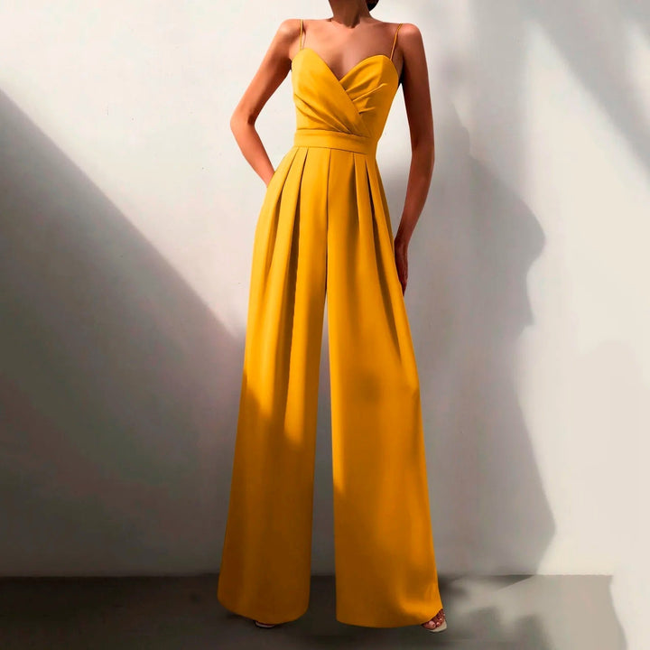 Combinaison estivale fluide, élégante.  Coupe ample, décolleté croisé, taille cintrée.  Parfait pour l'été.