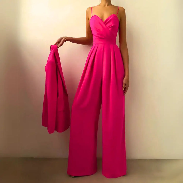 Combinaison estivale fluide, élégante.  Coupe ample, décolleté croisé, taille cintrée.  Parfait pour l'été.