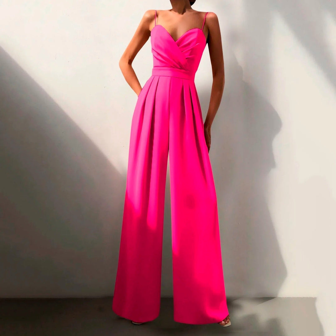Combinaison estivale fluide, élégante.  Coupe ample, décolleté croisé, taille cintrée.  Parfait pour l'été.