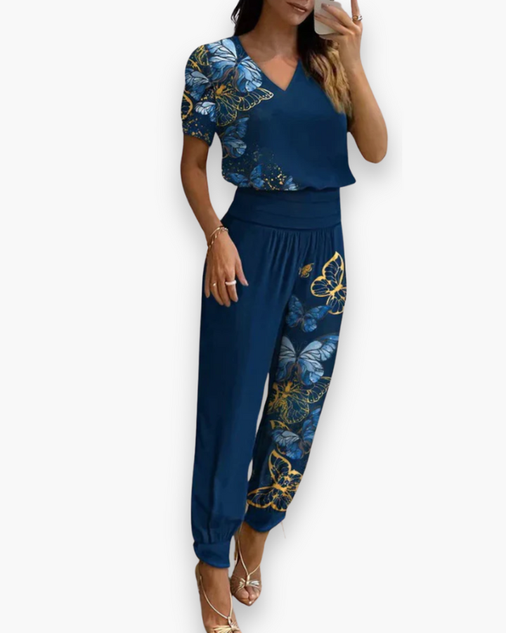 "Combinaison femme élégante moderne, ajustée, noir, col V, polyvalente, idéale pour style chic ou décontracté."