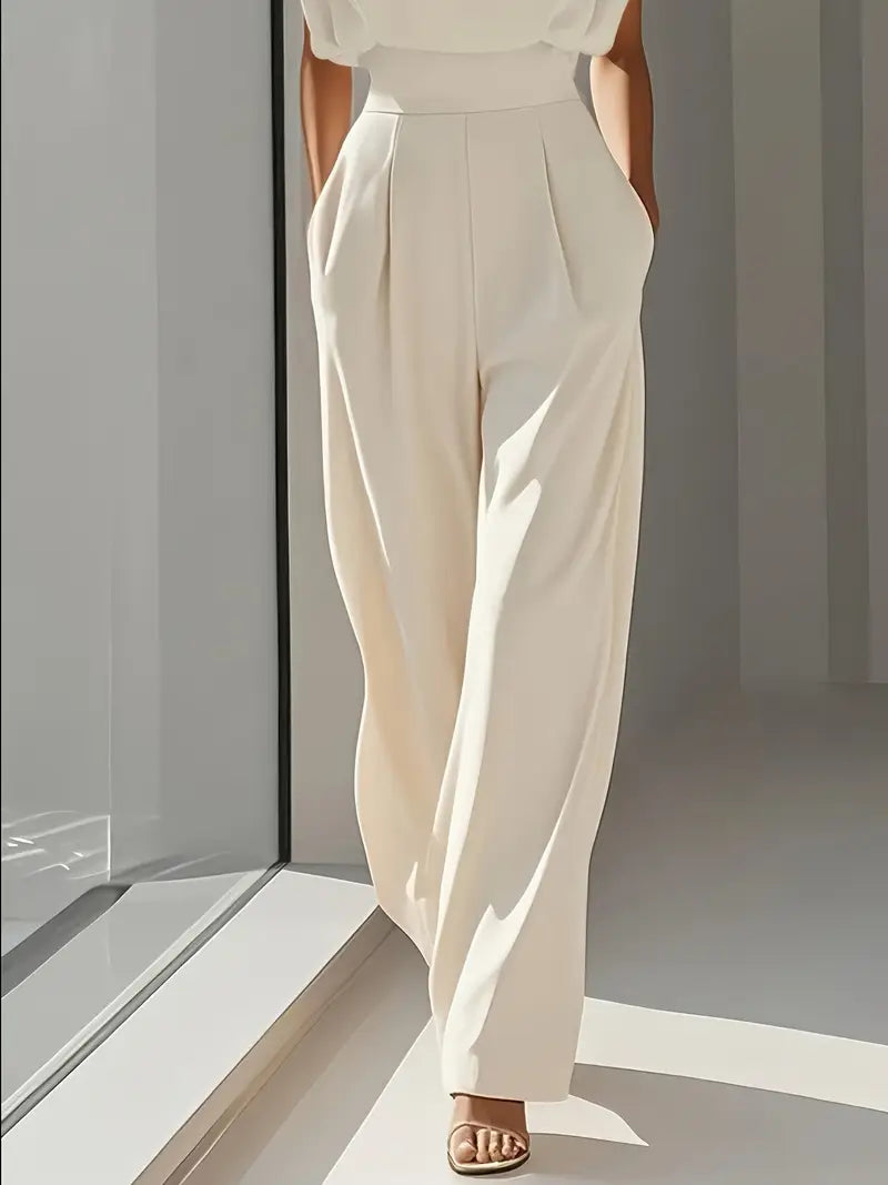Mode femme: Combinaison beige taille haute, jambes droites, style élégant. Parfaite pour un look tendance et confortable.