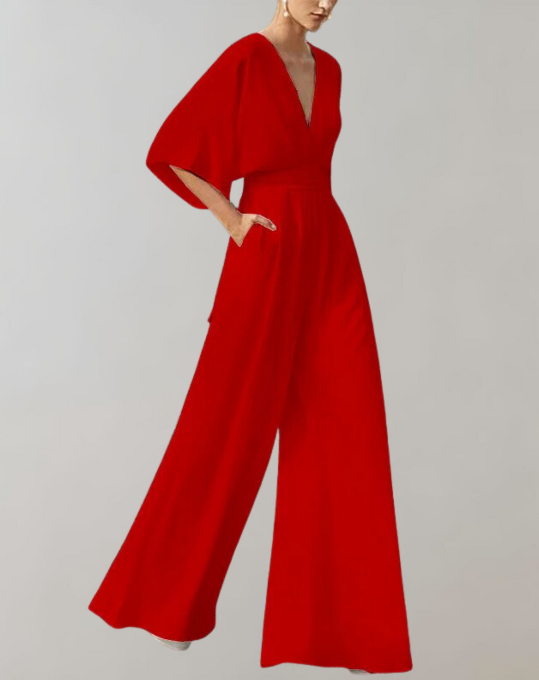 Combinaison femme polyvalente, style habillé, décolleté élégant et coupe confortable à jambes larges.