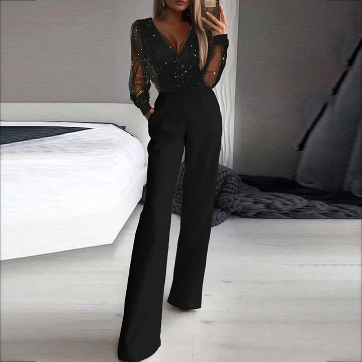 Combinaison femme noire scintillante à jambes larges et manches longues, parfaite pour une soirée élégante.