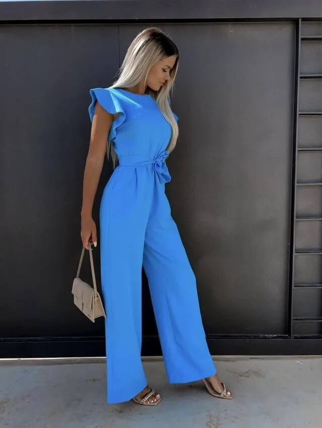Combinaison fluide, élégante et confortable. Coupe ample, manches volantées, ceinture intégrée. Plusieurs tailles disponibles