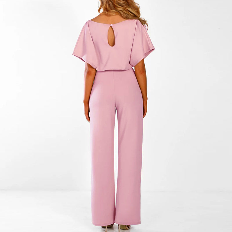 Élégante combinaison femme à jambes larges, style raffiné, parfaite pour une tenue chic de soirée.