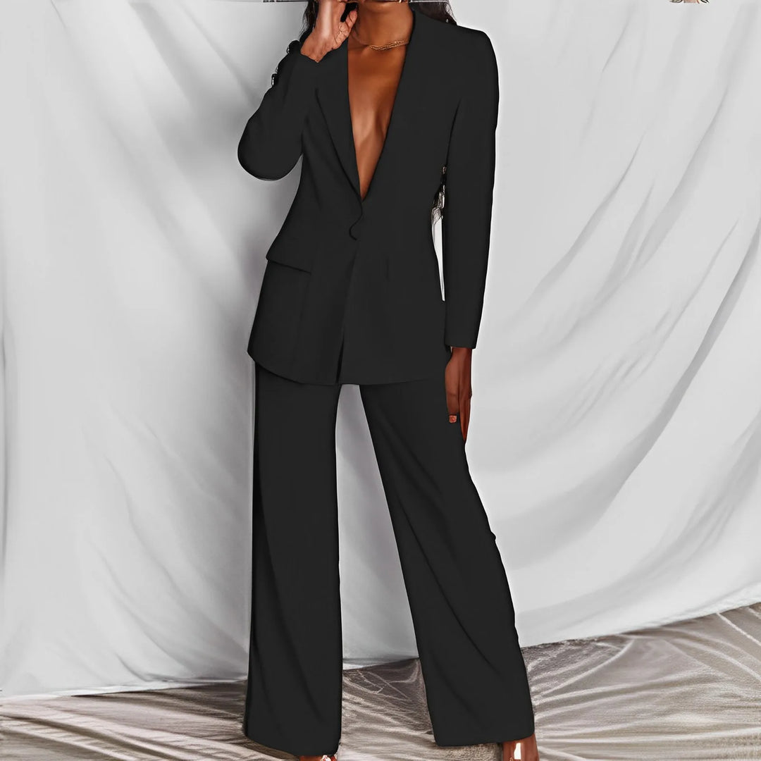 Costume femme élégant : blazer et pantalon taille haute.  Ensemble chic et professionnel.