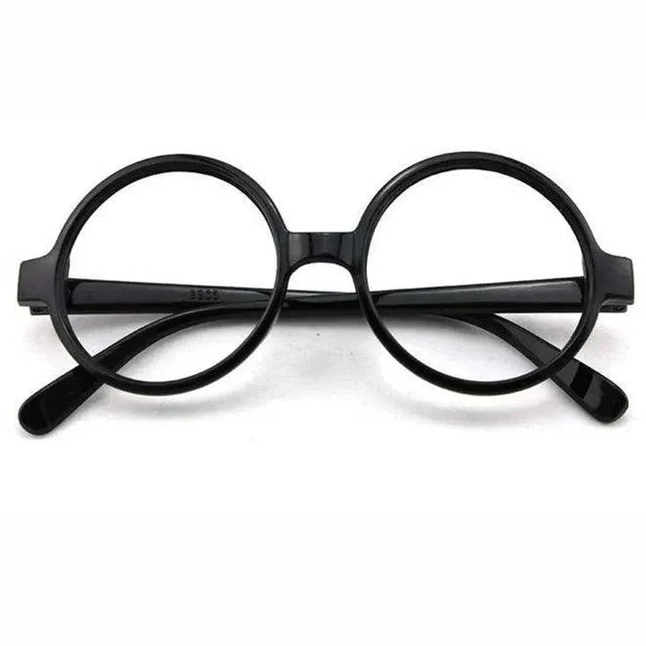 Détail de la robe de sorcier Harry Potter : emblème Poudlard brodé. Qualité supérieure pour déguisement enfant.