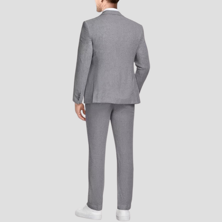 "Costume léger chic homme en lin-coton, tissu respirant, blazer deux boutons, pantalon fuselé élégant pour l'été."