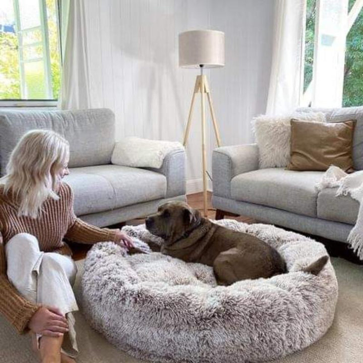 Coussin confortable pour chien, anti-stress.  Design apaisant, idéal pour un sommeil paisible.