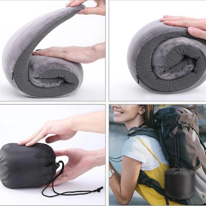 "Coussin de voyage ergonomique en mousse gris, compact, design en U pour soutien cervical optimal et confort en déplacement."