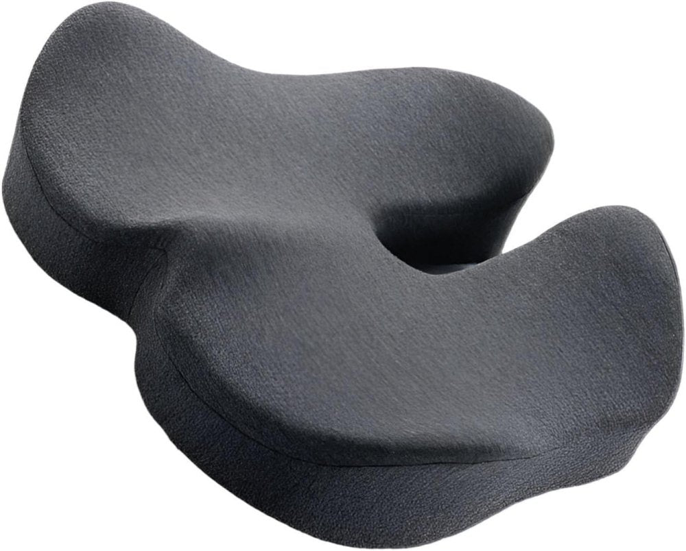 Coussin ergonomique beige pour soulager douleur nerf pudendal, mousse haute densité, forme anatomique avec découpe.