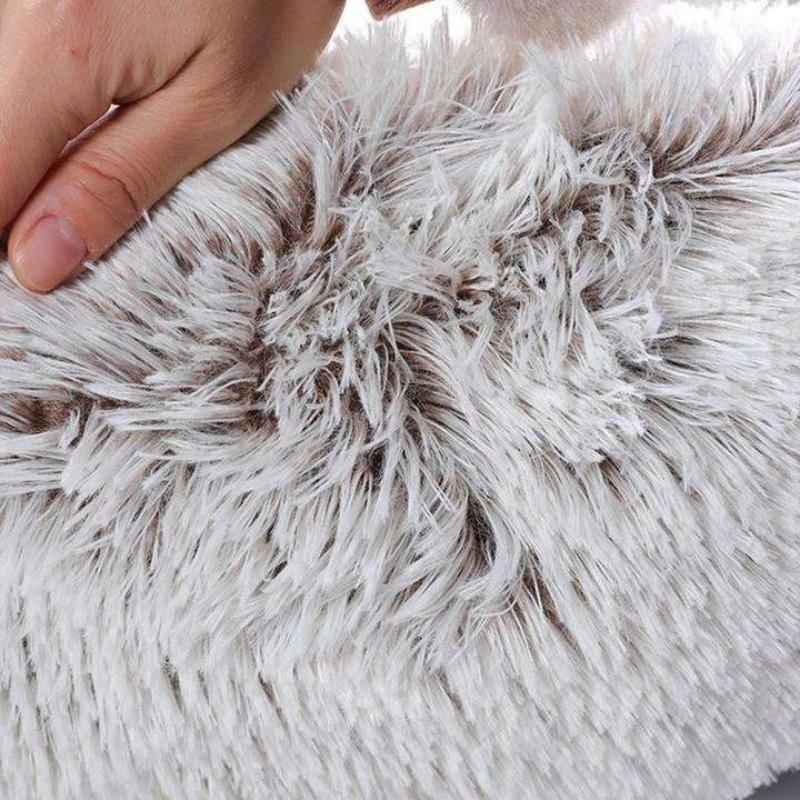 Coussin moelleux anti-stress pour chat.  Confort optimal, design ergonomique. Plusieurs tailles et couleurs.