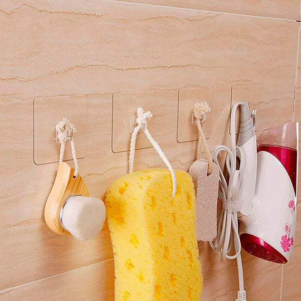 "Crochets adhésifs réutilisables transparents, forte tenue jusqu'à 5 kg, design discret, pour organisation sans perçage."