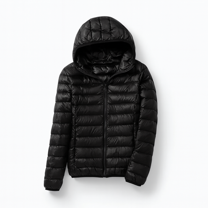 Doudoune matelassée femme, vue de côté, design élégant pour la mode hivernale. Chaleur assurée.