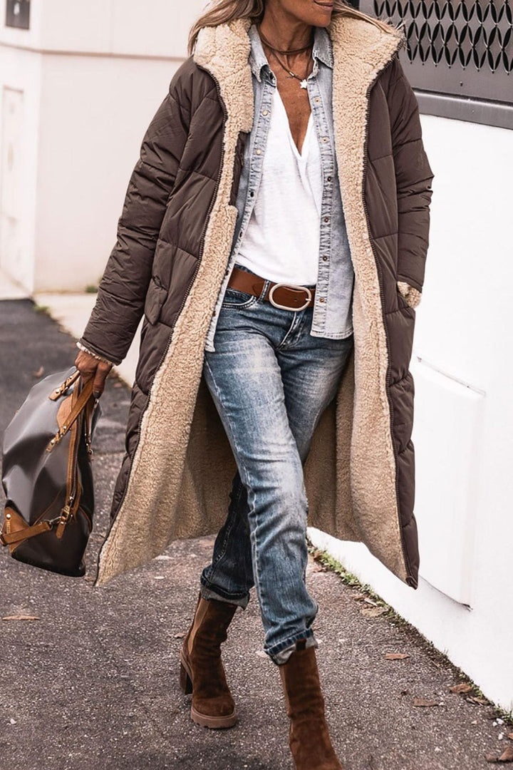 Manteau doudoune femme tendance, chaud et élégant, parfait pour les sorties hivernales.