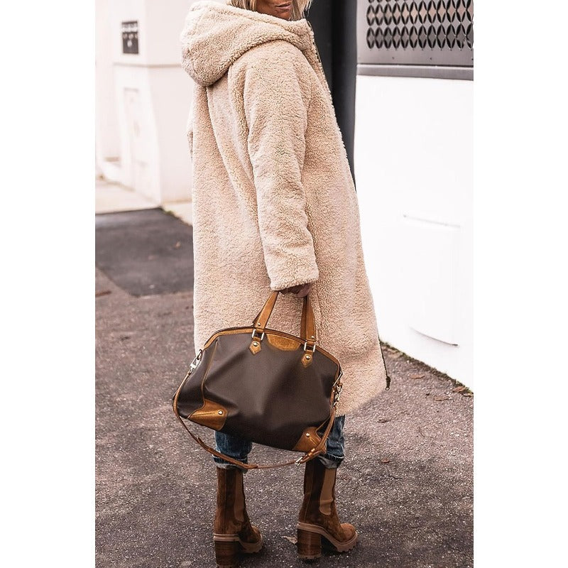 Veste doudoune femme tendance, style chic et chaleur douce pour l'extérieur.