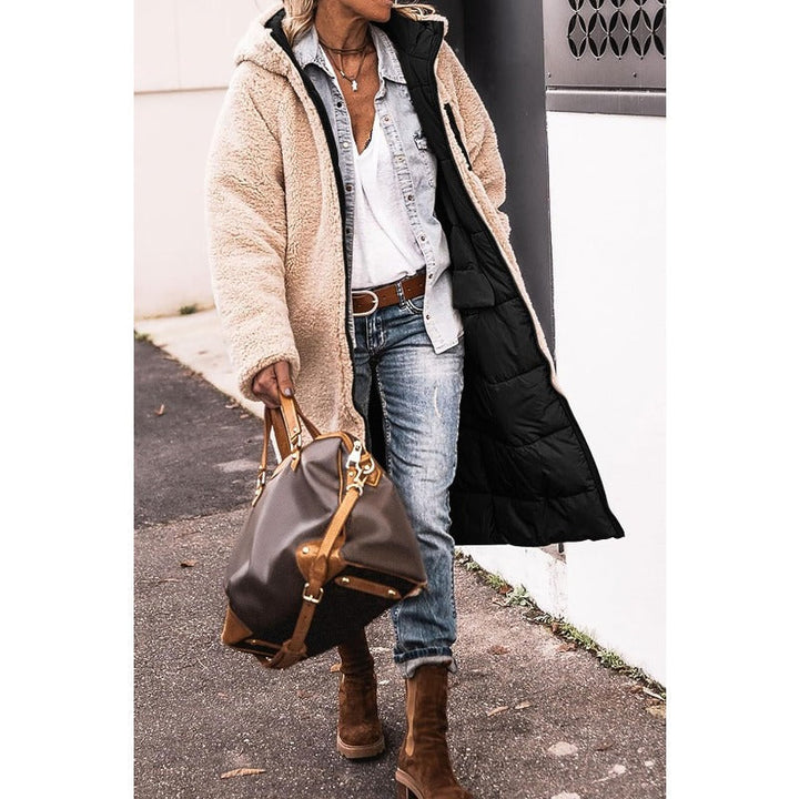 Doudoune femme chaude et confortable, parfaite pour les froides journées d'hiver.