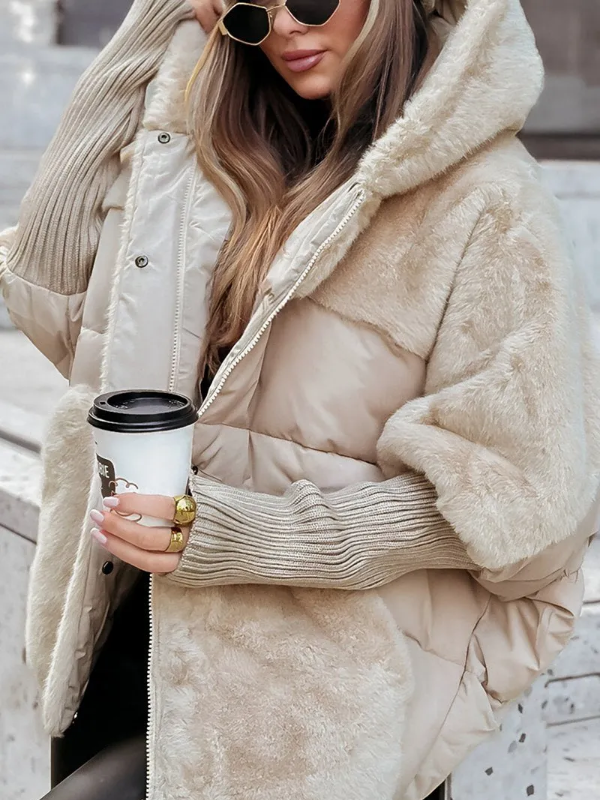 Doudoune femme chic et chaude, veste matelassée hiver. Vêtement moderne avec col et poignets élégants, grand confort.