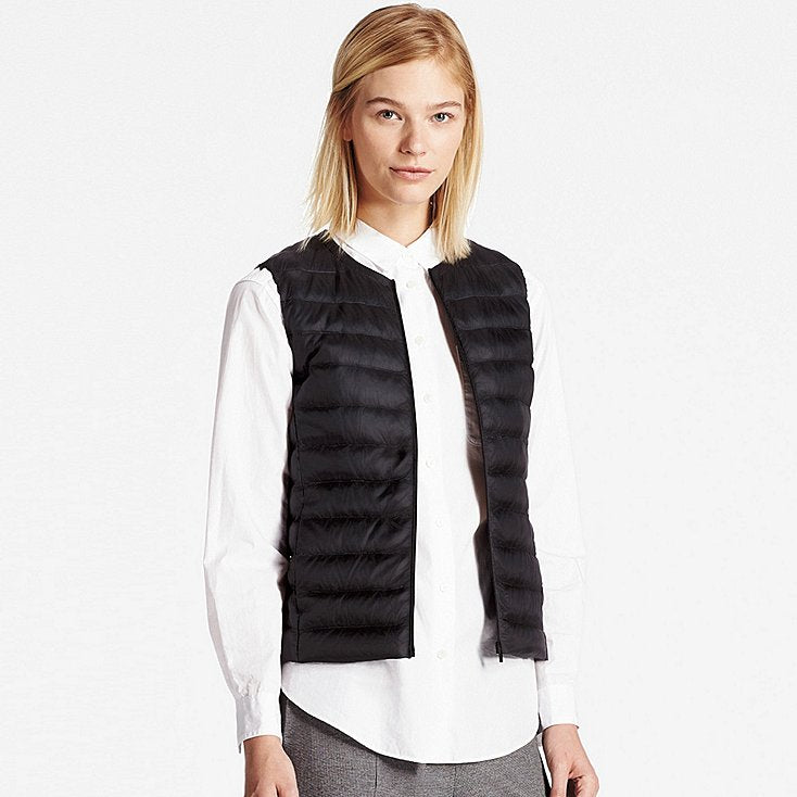 "Doudoune sans manches ultra-légère pour femme, design chic, compacte, avec traitement déperlant, idéale par tous les temps."