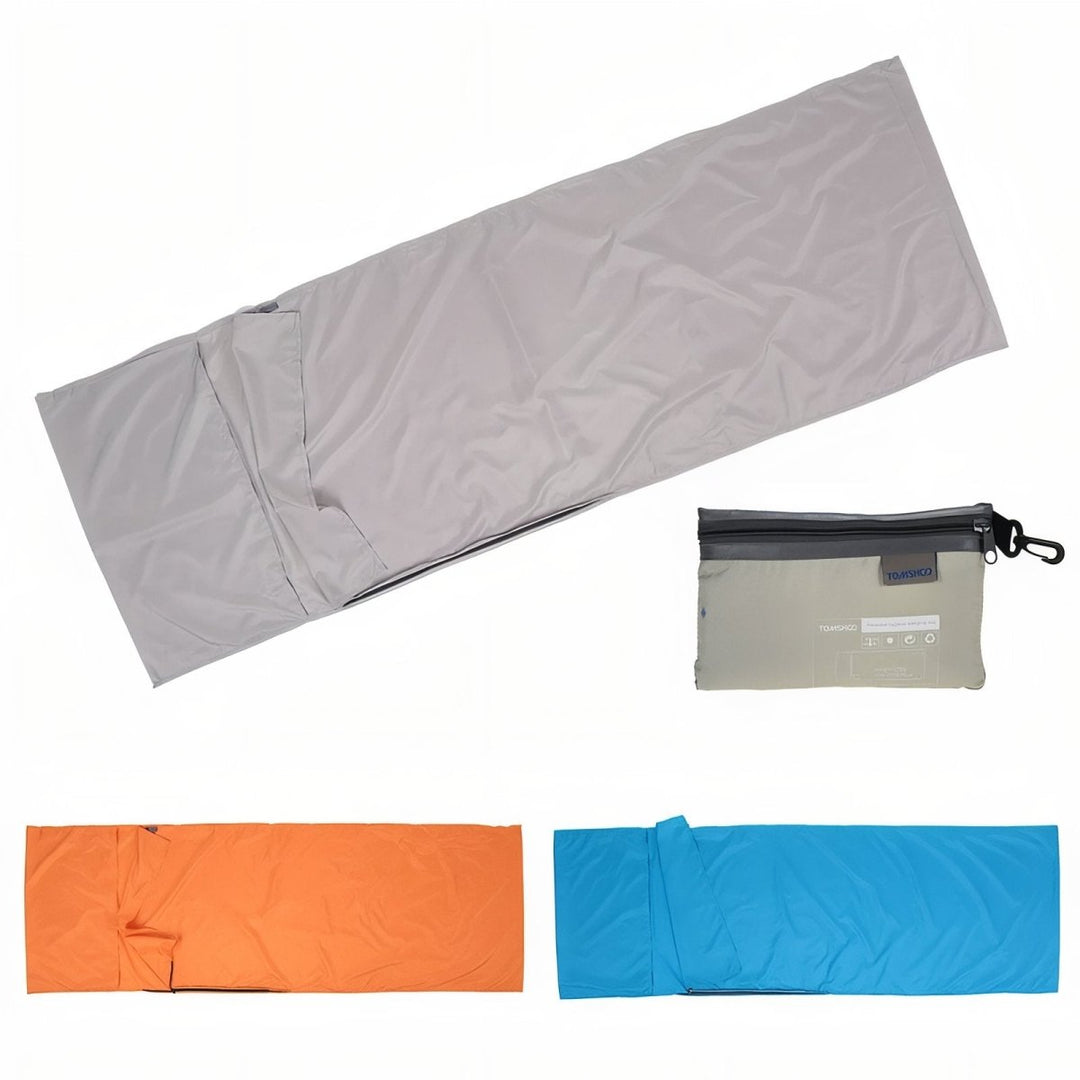 "Drap de sac de couchage léger et respirant pour bivouac, idéal pour aventures en plein air et trekking, structure douce."