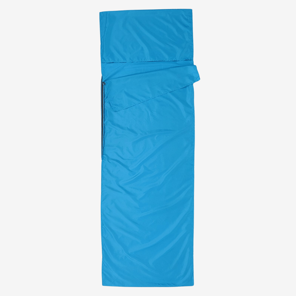 "Drap de sac de couchage léger et respirant pour bivouac, idéal pour aventures en plein air et trekking, structure douce."