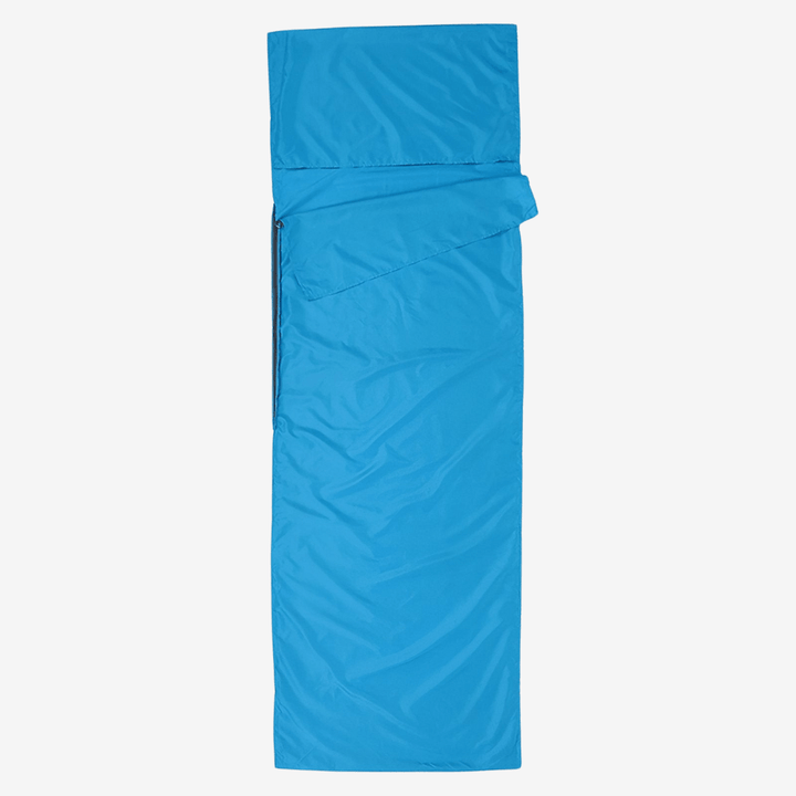 "Drap de sac de couchage léger et respirant pour bivouac, idéal pour aventures en plein air et trekking, structure douce."