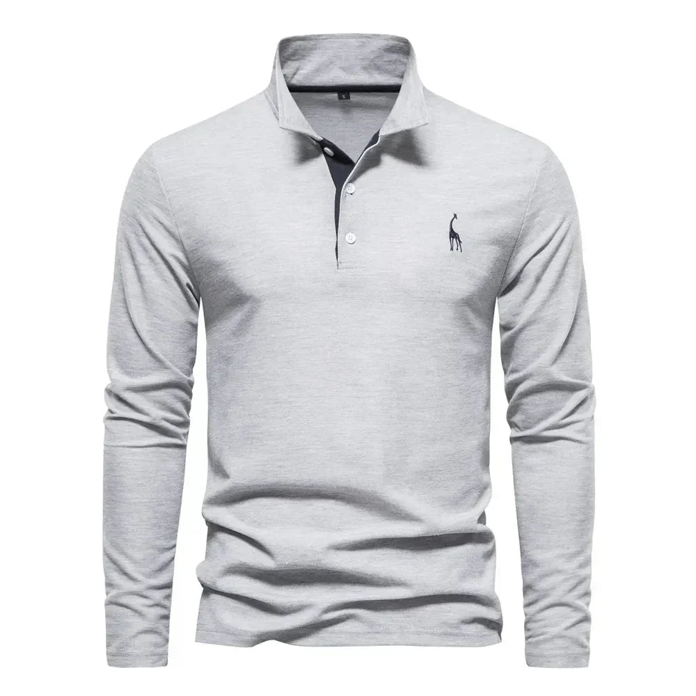 "Élégant polo à manches longues homme avec broderie, col classique, en coton respirant, coloris navy et orange."