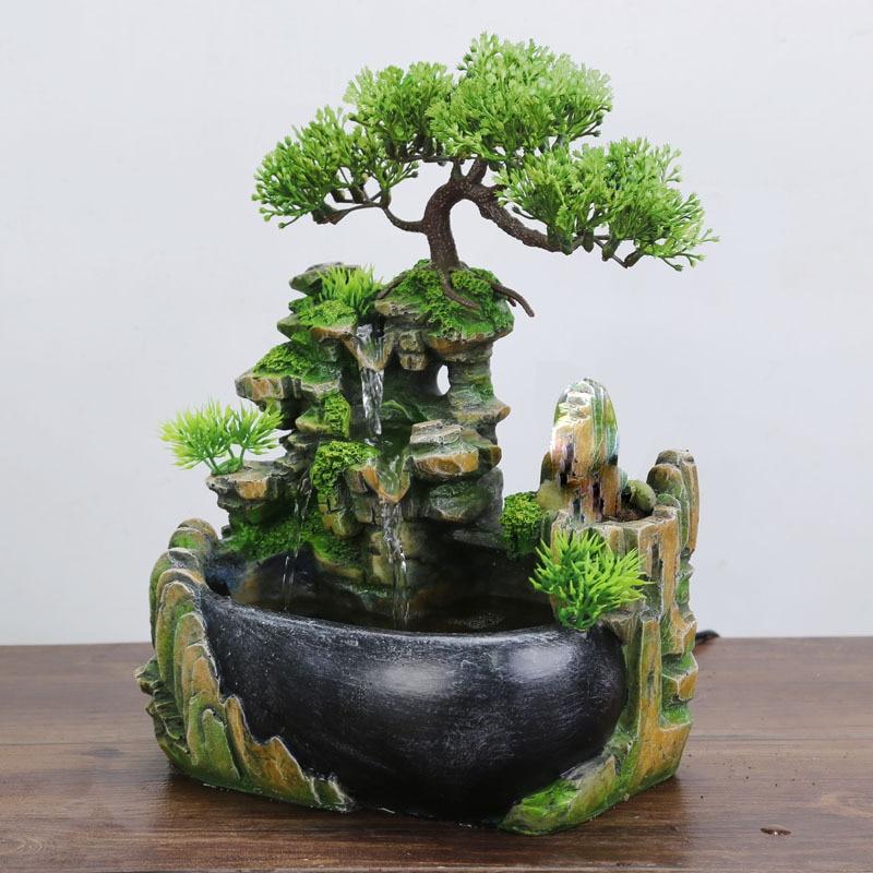 Elegant tabletop cascading water fountain.  Feng Shui design promotes serenity and prosperity.  Home décor.