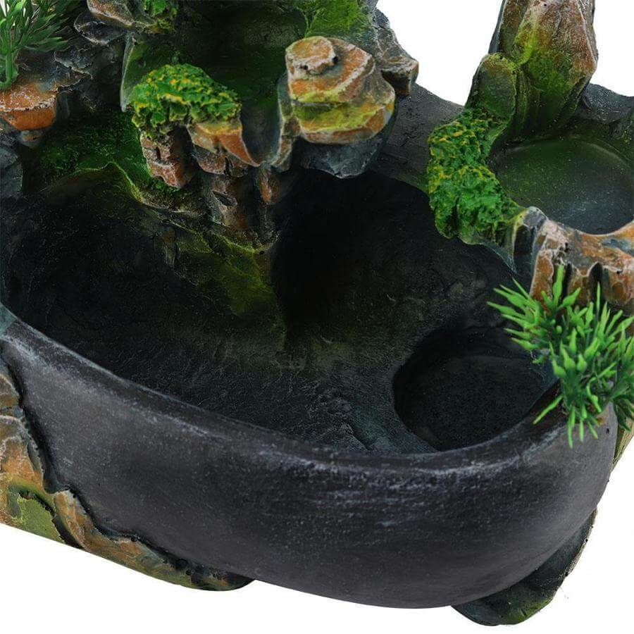 Elegant tabletop cascading water fountain.  Feng Shui design promotes serenity and prosperity.  Home décor.