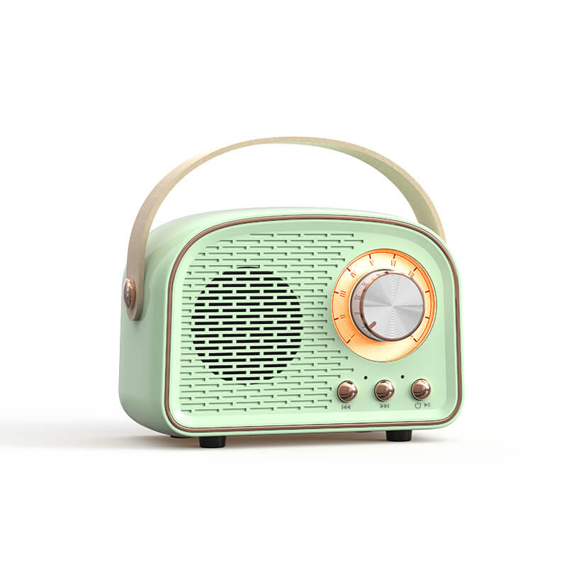 Enceinte Bluetooth vintage, son rétro, radio FM intégrée. Design compact et élégant.