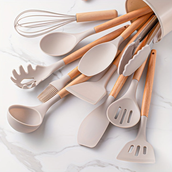 Ensemble 12 ustensiles cuisine silicone antiadhésifs.  Idéal pour mélanger, remuer.  Lavable au lave-vaisselle.