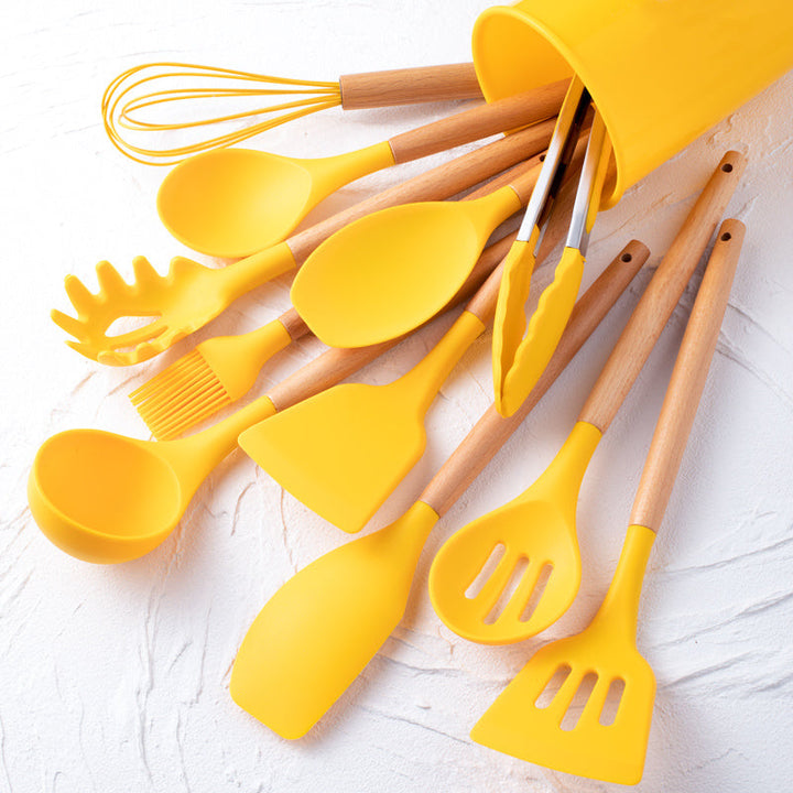 Ensemble 12 ustensiles cuisine silicone antiadhésifs.  Idéal pour mélanger, remuer.  Lavable au lave-vaisselle.