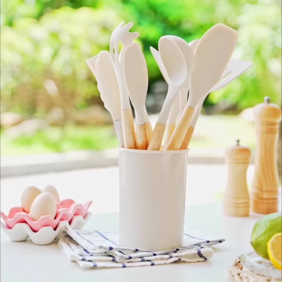 Ensemble 12 ustensiles cuisine silicone antiadhésifs.  Idéal pour mélanger, remuer.  Lavable au lave-vaisselle.
