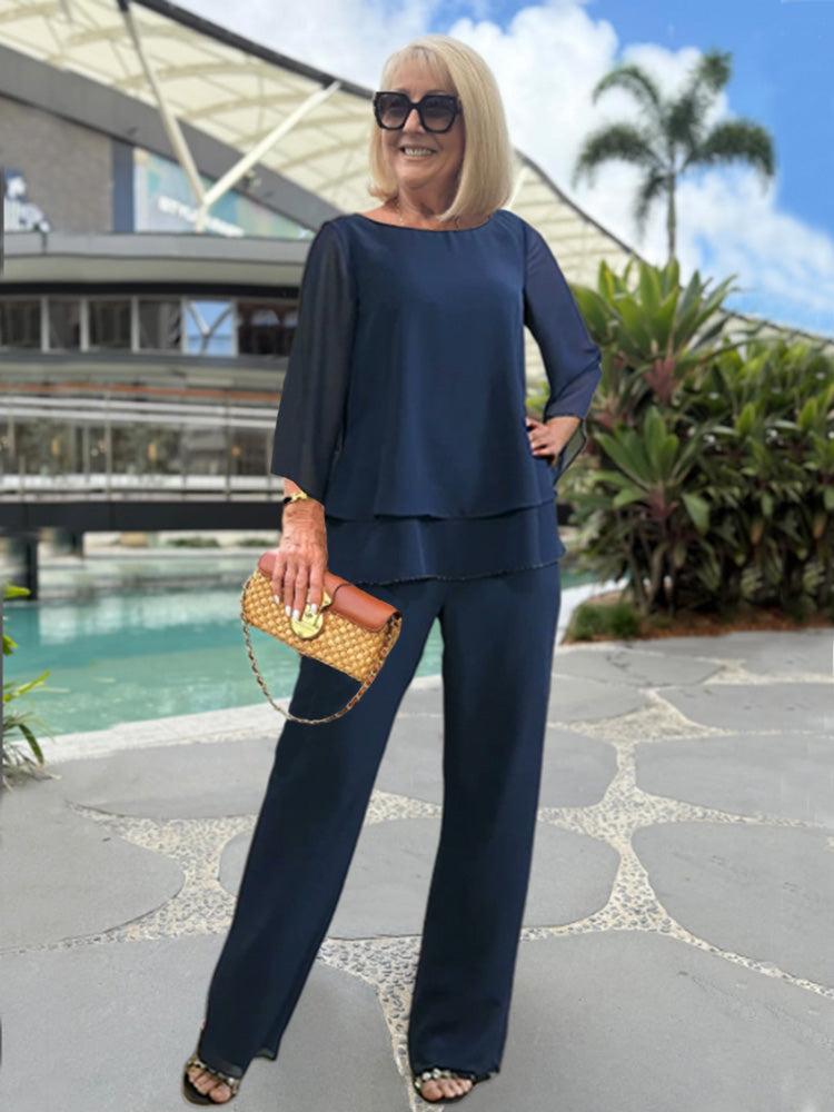 Tenue femme polyvalente: ensemble pantalon confortable et haut 3/4 bleu. Mode femme élégante et pratique.