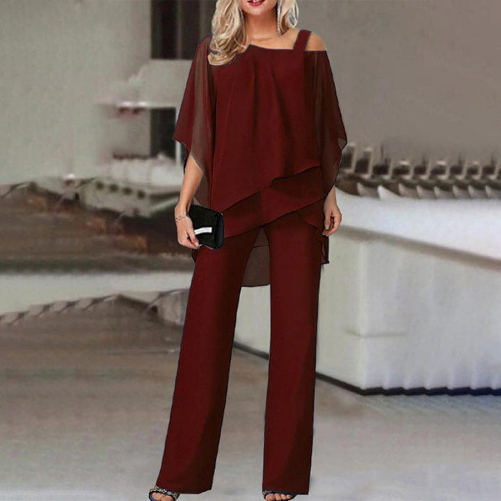 Ensemble 2 pièces femme élégant en polyester, parfait pour soirée chic ou cérémonie. Pantalon et haut assortis.