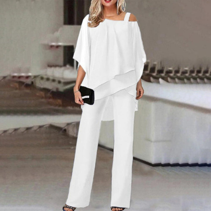 Tenue 2 pièces chic pour femme, idéale pour cérémonie ou événement spécial. Ensemble élégant pantalon et top.