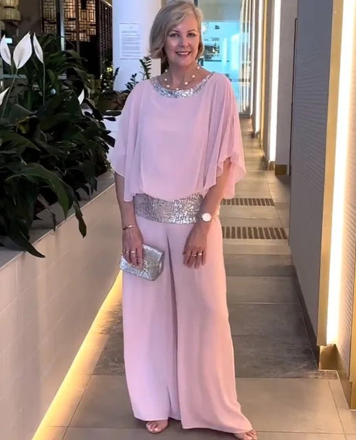Ensemble 2 pièces femme élégant, pantalon et haut chic, parfait pour une tenue coordonnée et stylée.