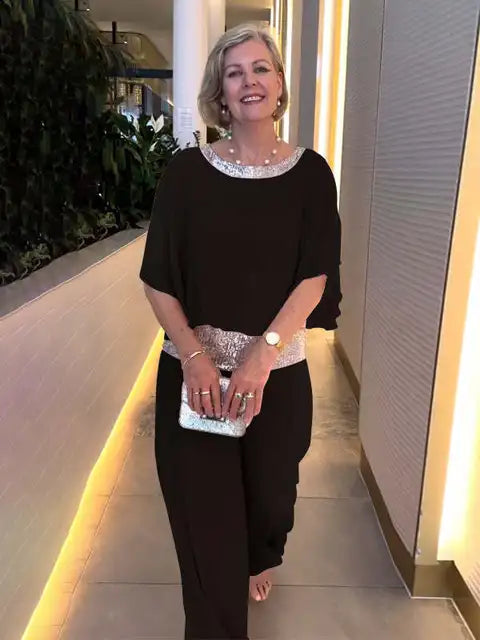 Ensemble femme chic avec pantalon et haut coordonné, 2 pièces élégantes pour un style féminin raffiné.