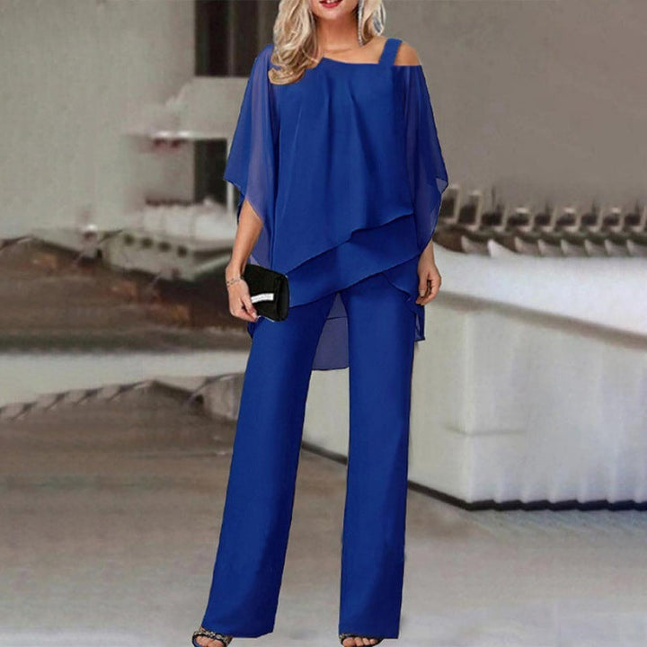 Ensemble 2 pièces élégant, manches batwing.  Parfait pour occasions spéciales.