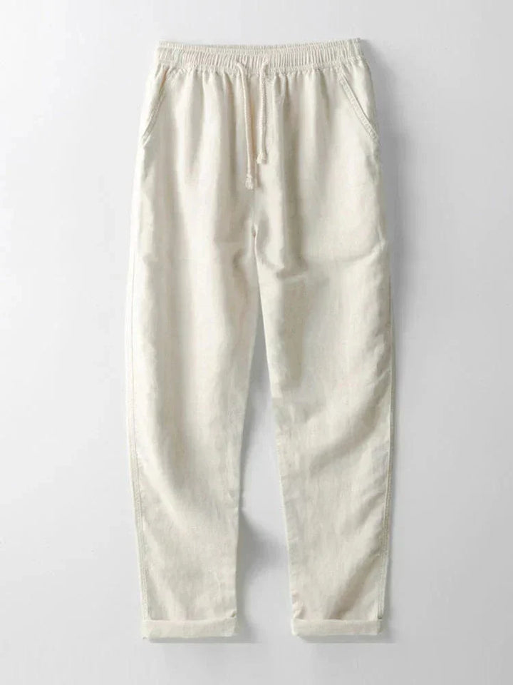 "Ensemble Ariano femme: chemise blanche à boutons et pantalon en lin beige, style élégant et décontracté pour l'été."