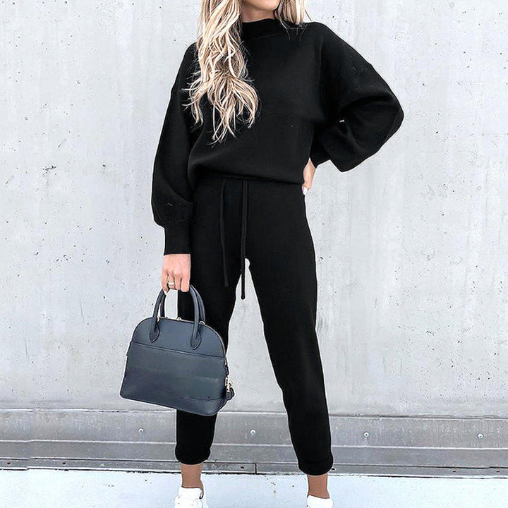 Ensemble chic blanc Anne-Sophie, haut manches longues et pantalon doux. Mode tendance femme, confort assuré.